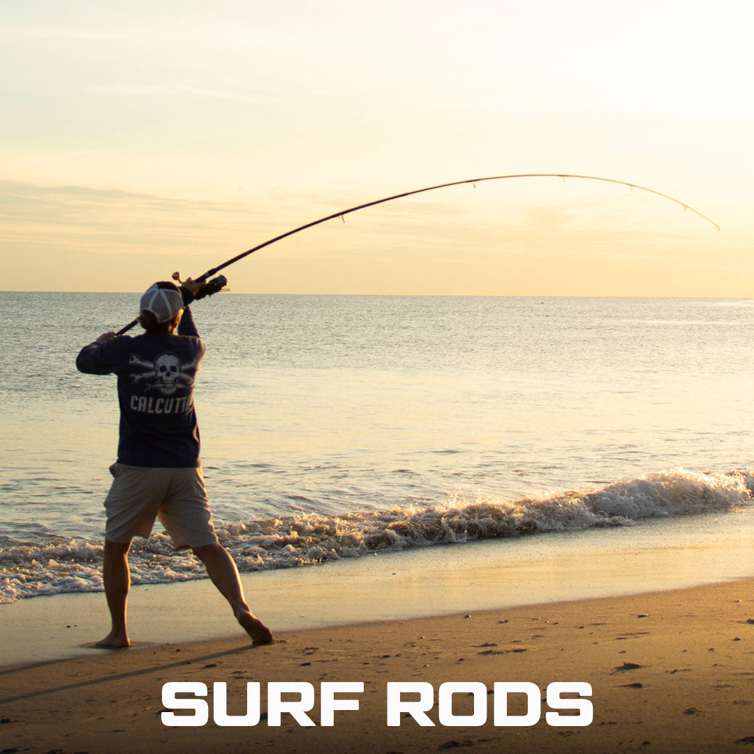 Fisherman casting a surf rod into the ocean