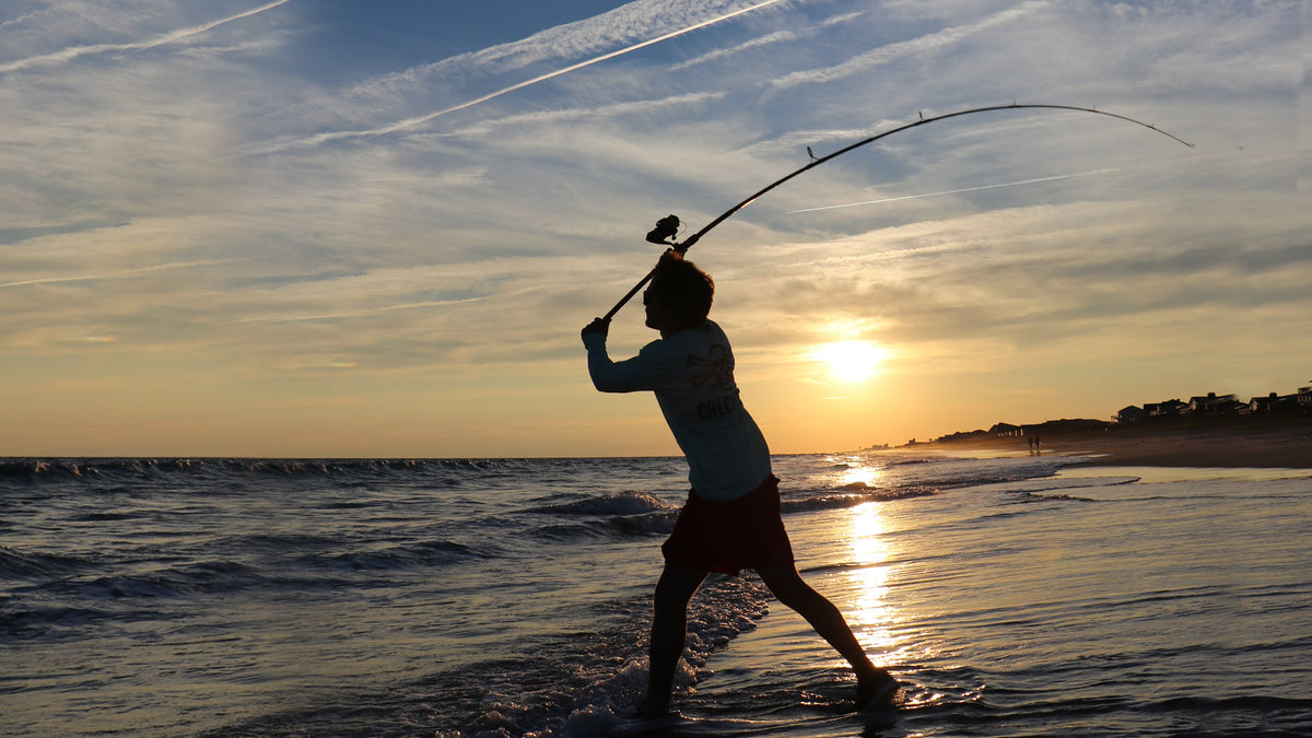 Surf fisherman casting a Star Rods surf rod